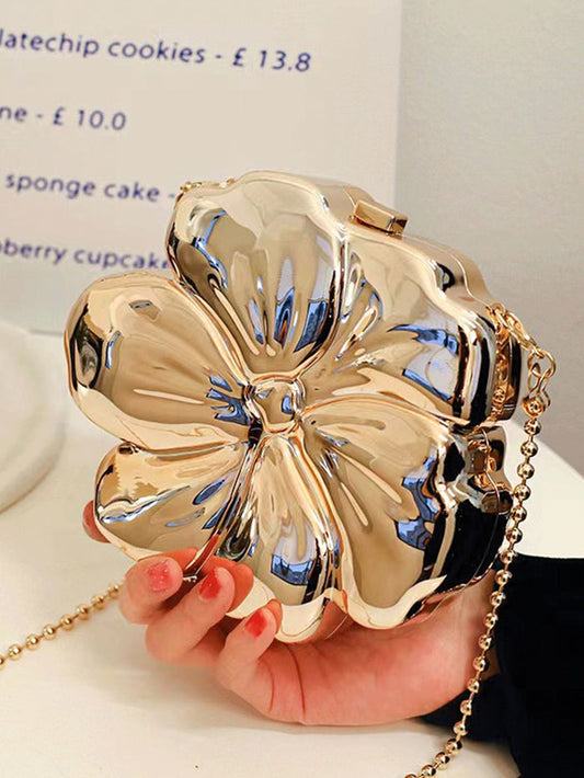 Elevate your evening look with this Golden Acrylic Clutch